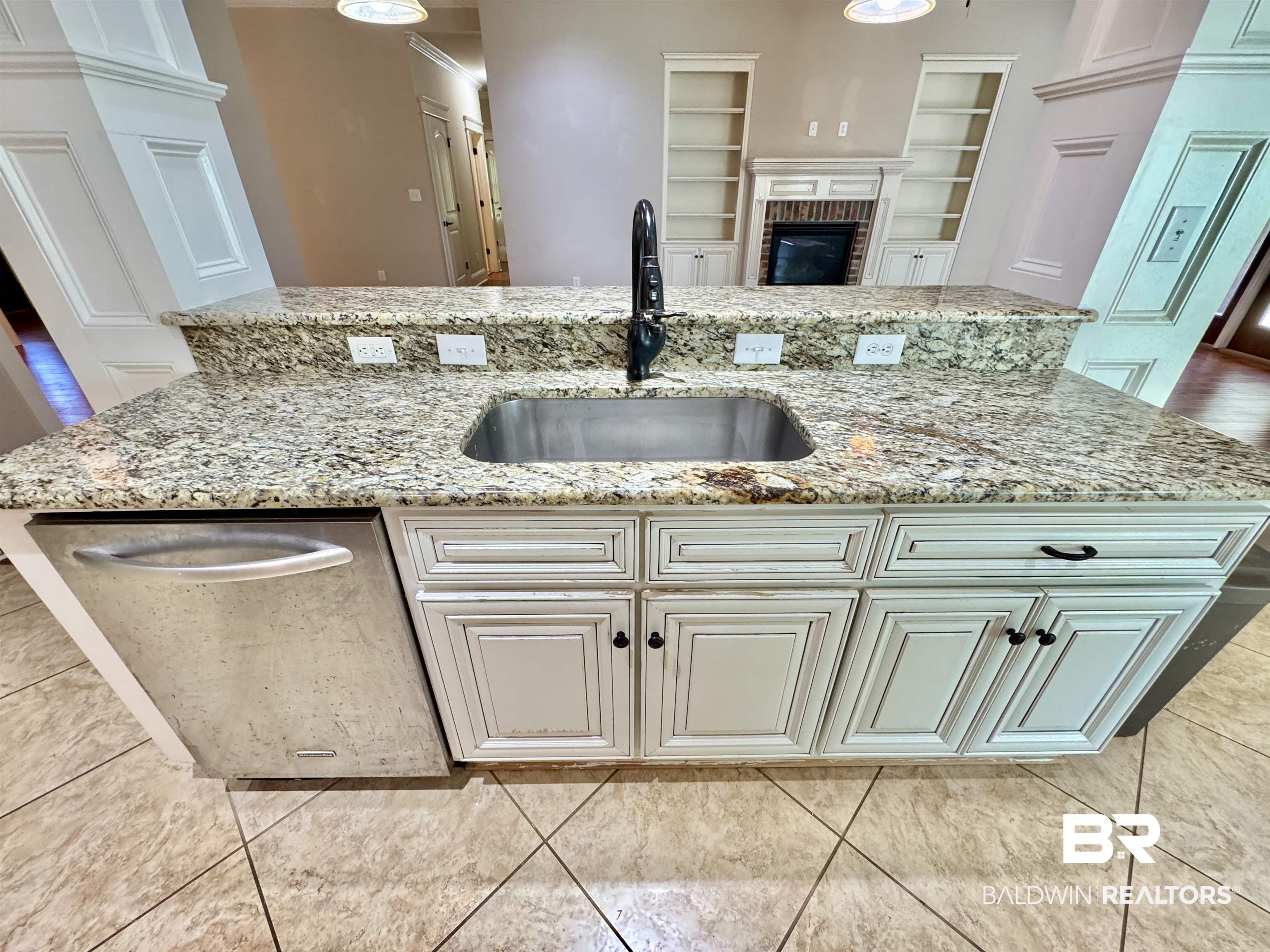 10846 County Road 138 Bay Minette, AL 36507 - Photo 42 of 53 Kitchen with a center island with sink, sink, light stone countertops, and dishwasher