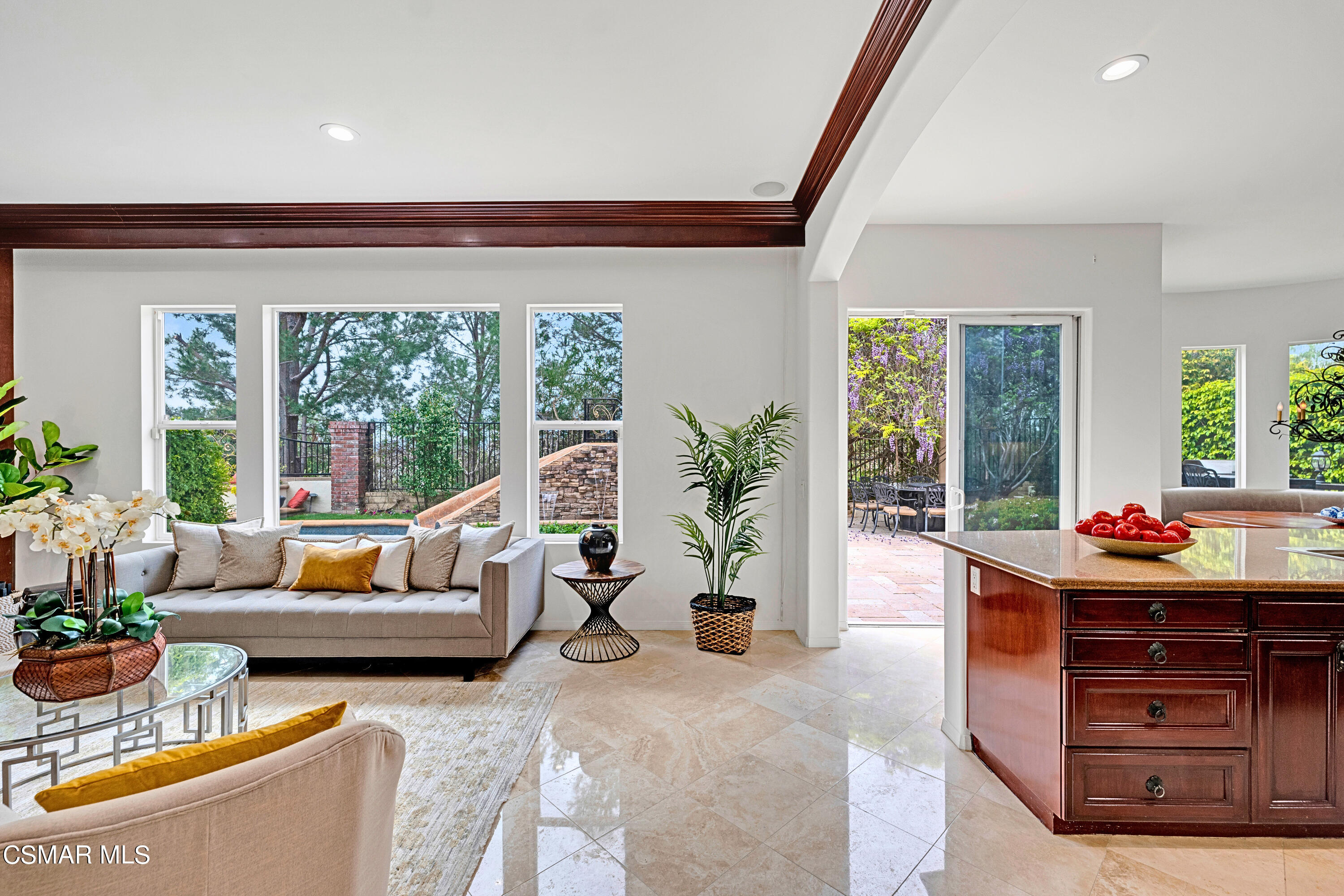 6196 Deerhill Road Oak Park, CA 91377 - Photo 16 of 46 a living room with furniture and a large window