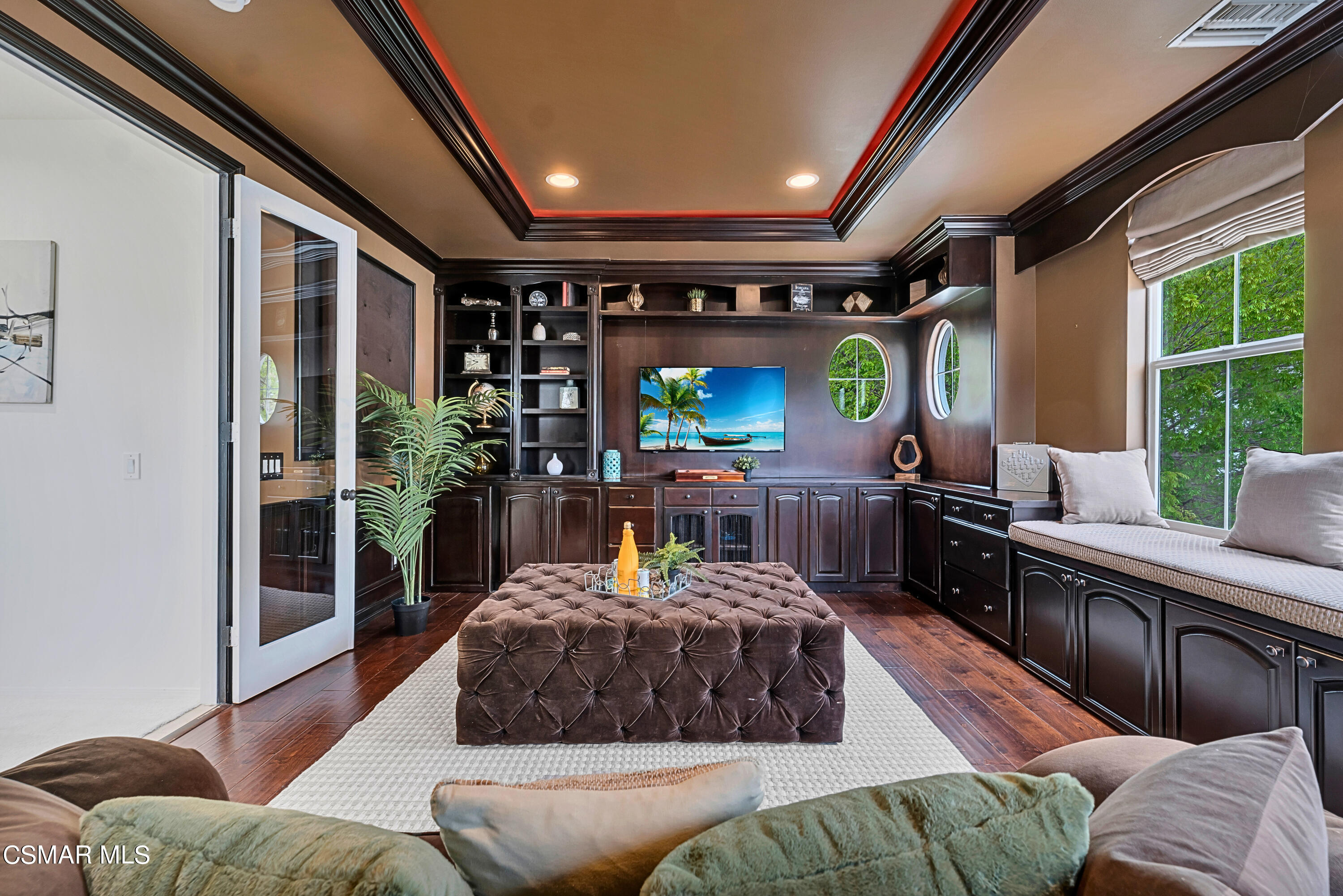 6196 Deerhill Road Oak Park, CA 91377 - Photo 30 of 46 a living room with furniture and a large window