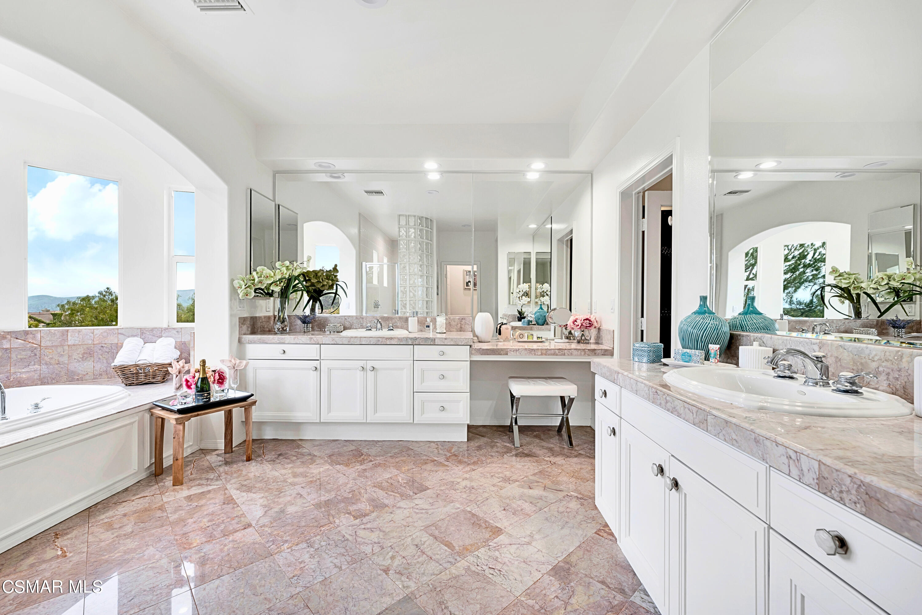 6196 Deerhill Road Oak Park, CA 91377 - Photo 35 of 46 a bathroom with a granite countertop sink mirror and a