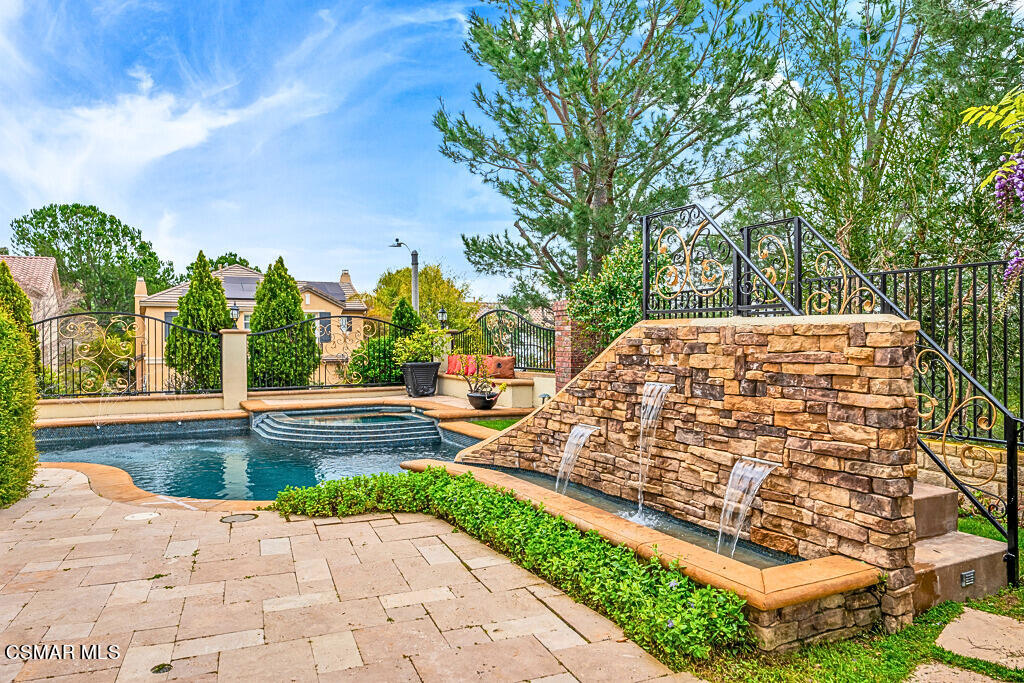 6196 Deerhill Road Oak Park, CA 91377 - Photo 40 of 46 a view of outdoor space yard and swimming pool