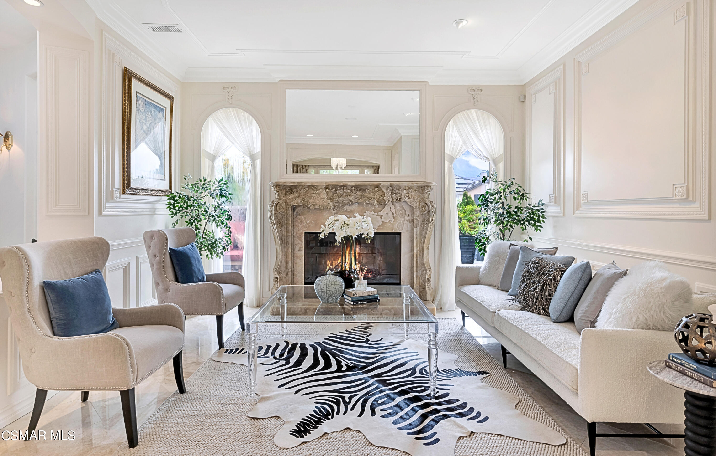 6196 Deerhill Road Oak Park, CA 91377 - Photo 7 of 46 a living room with furniture and a large mirror