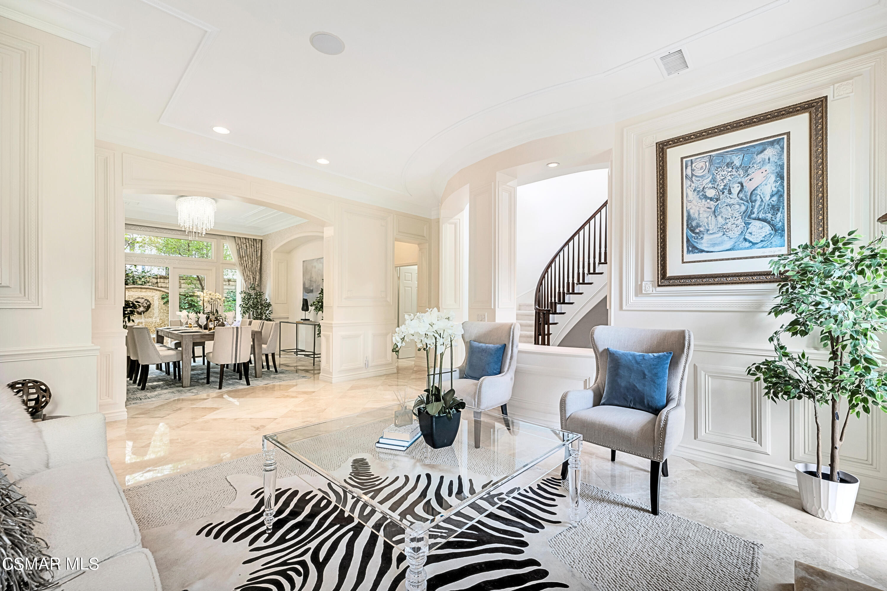 6196 Deerhill Road Oak Park, CA 91377 - Photo 8 of 46 a living room with furniture a dining table and a potted plant