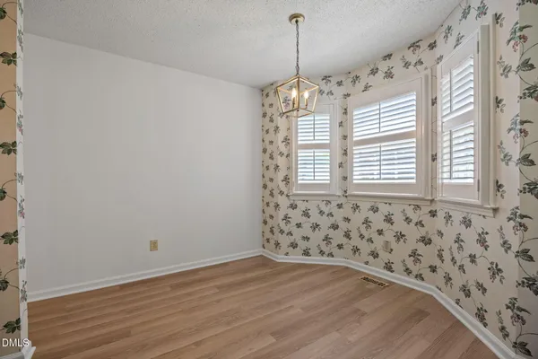 $300,000 | 8321 Hempshire Place, Unit 104, Raleigh, NC 27613