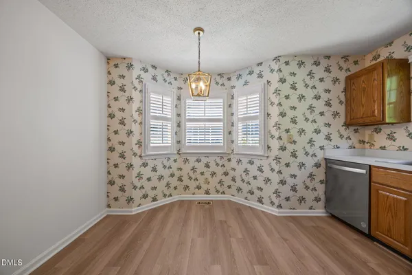 $300,000 | 8321 Hempshire Place, Unit 104, Raleigh, NC 27613
