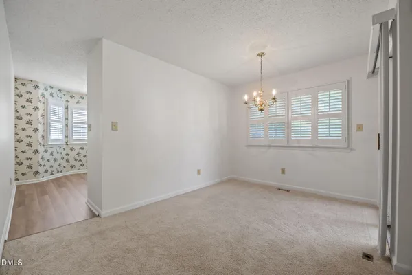 $300,000 | 8321 Hempshire Place, Unit 104, Raleigh, NC 27613