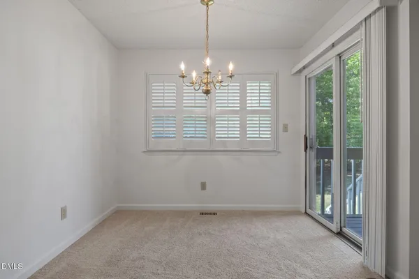 $300,000 | 8321 Hempshire Place, Unit 104, Raleigh, NC 27613
