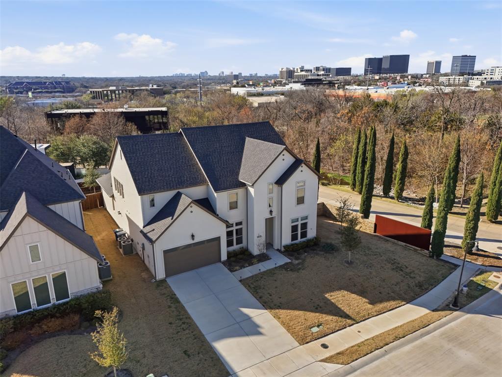 9435 Rockmount Drive Dallas, TX 75243 - Photo 29 of 32 a view of a house with a terrace