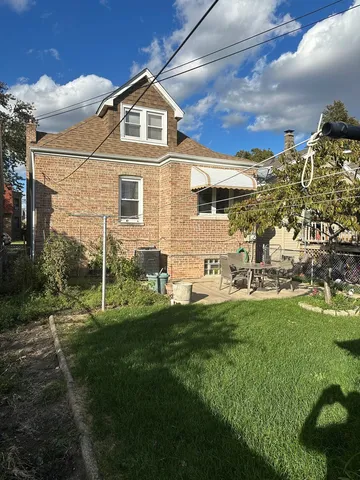 a front view of a house with a garage