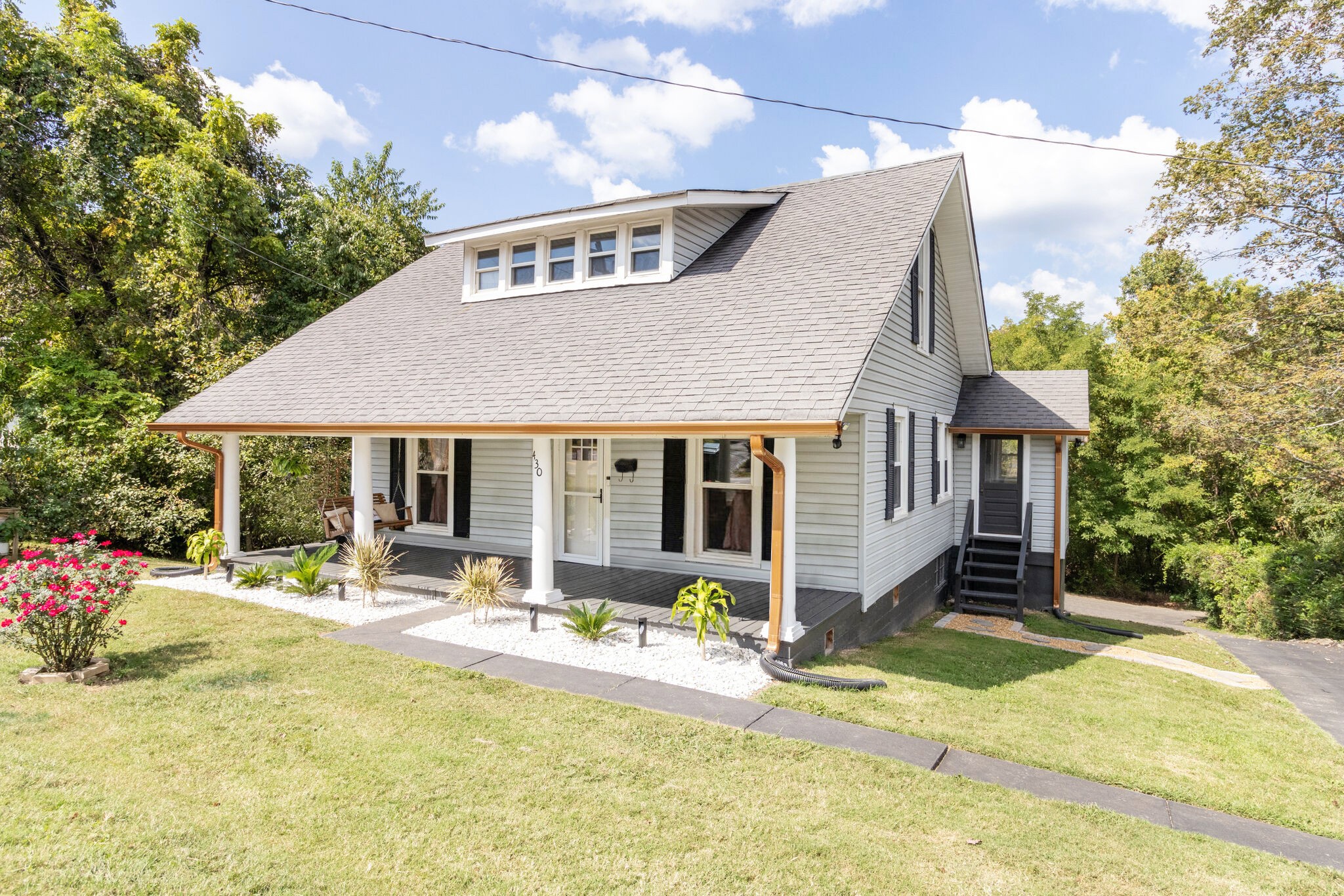 430 Center Avenue Dickson, TN 37055 - Photo 1 of 14 a front view of house with yard and seating area