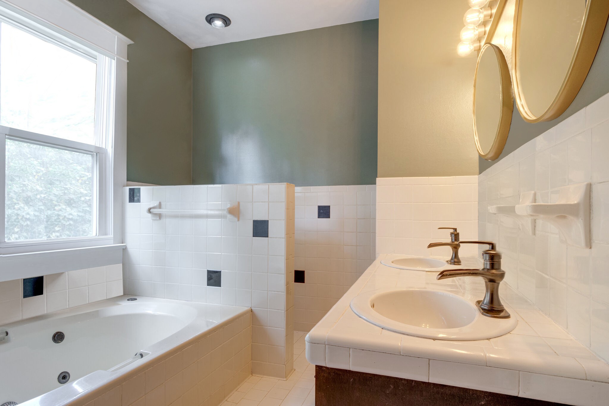 430 Center Avenue Dickson, TN 37055 - Photo 12 of 14 a bathroom with a sink and a bathtub