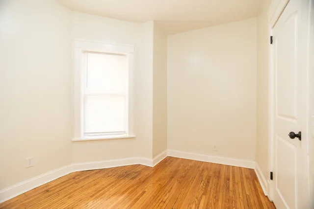 a view of a room that has a window in it