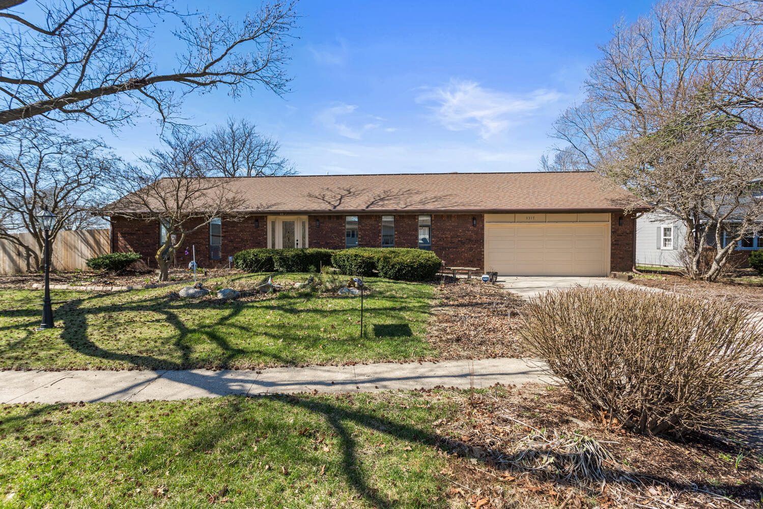 2317 Brookshire East Champaign, IL 61821 - Photo 1 of 32 a front view of a house with a yard