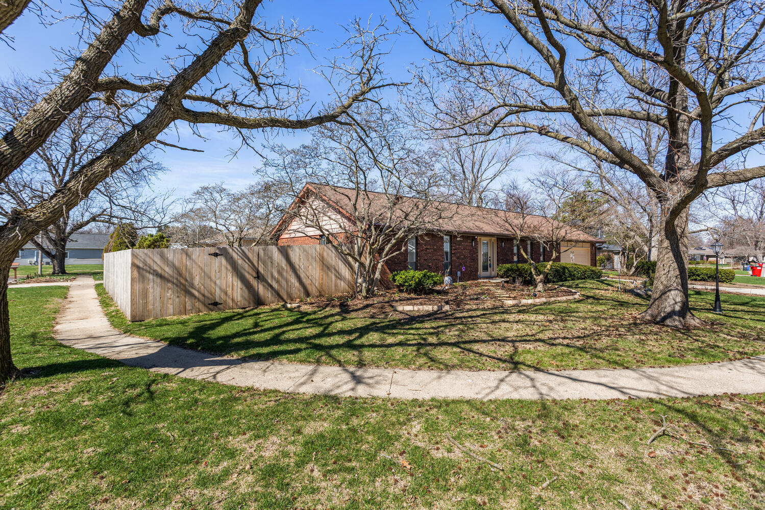 2317 Brookshire East Champaign, IL 61821 - Photo 2 of 32 a front view of a house with a yard