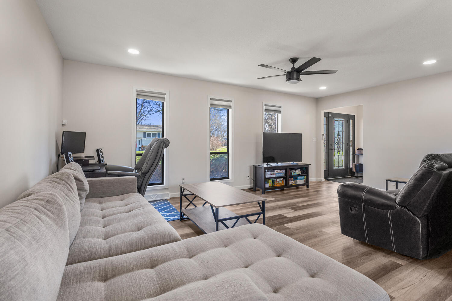 2317 Brookshire East Champaign, IL 61821 - Photo 8 of 32 a living room with furniture and a flat screen tv