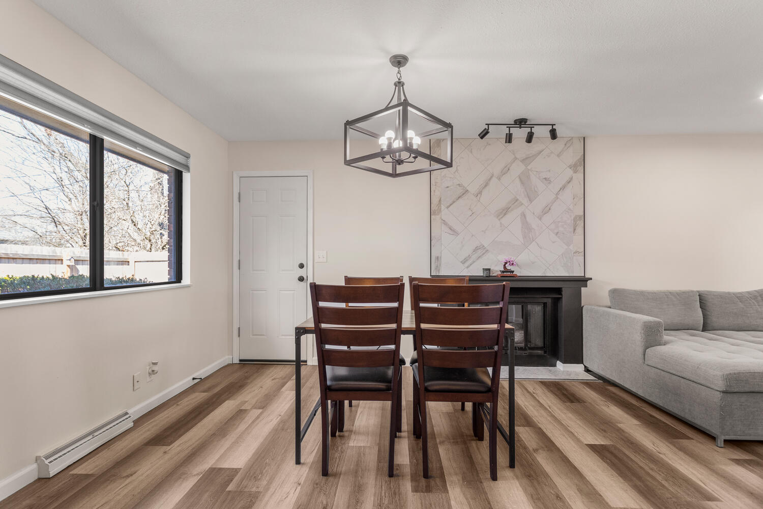 2317 Brookshire East Champaign, IL 61821 - Photo 10 of 32 a view of a dining room with furniture window and wooden floor