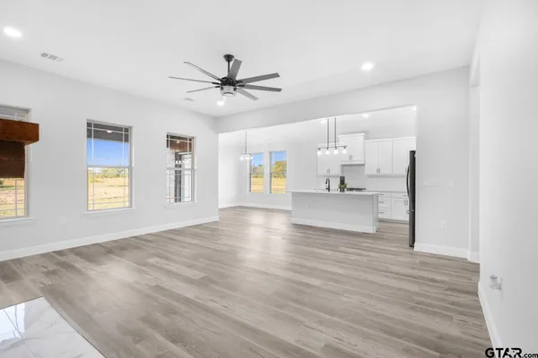a view of an empty room and window