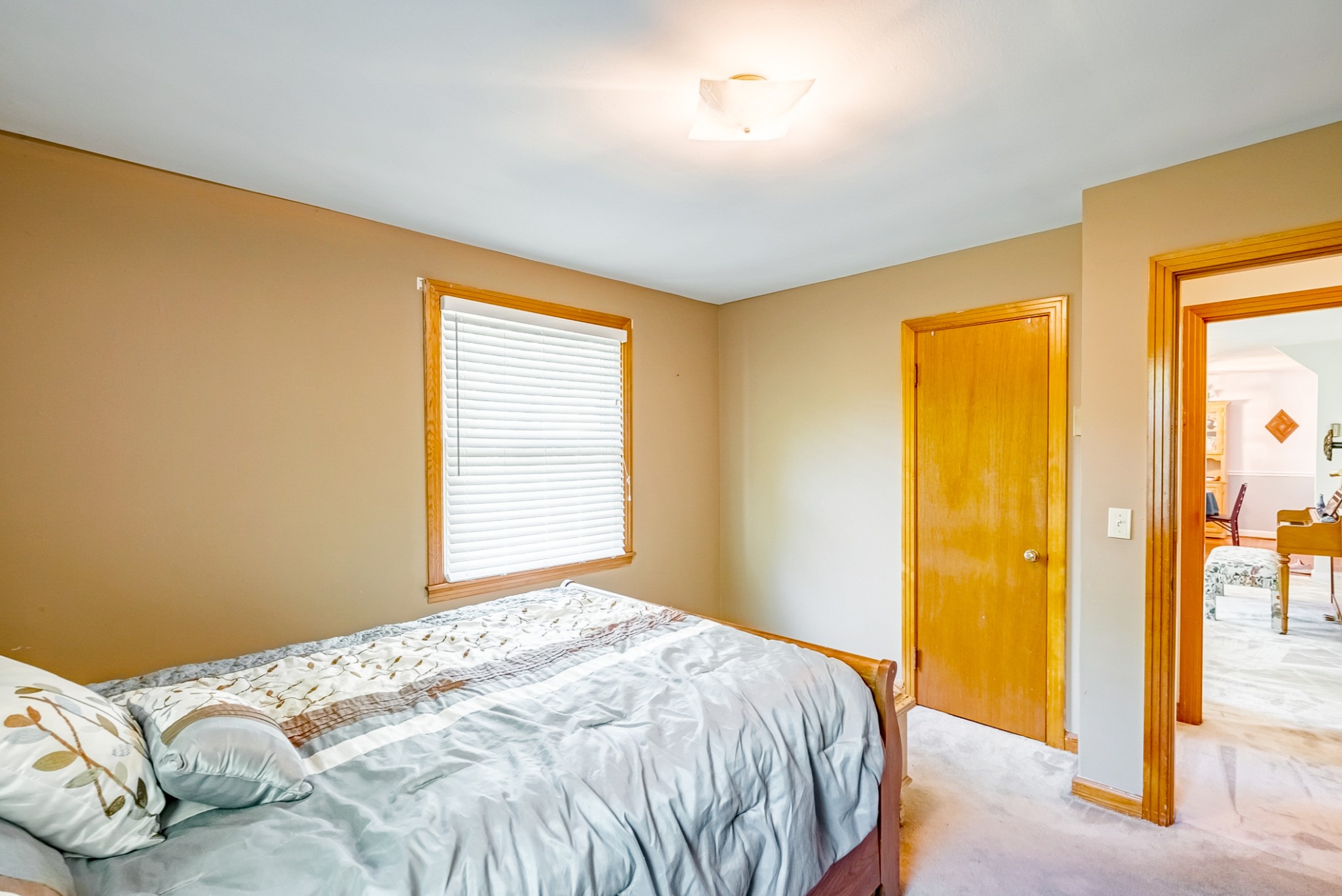 922 Neelys Bend Road Madison, TN 37115 - Photo 11 of 35 a bedroom with a bed and a window