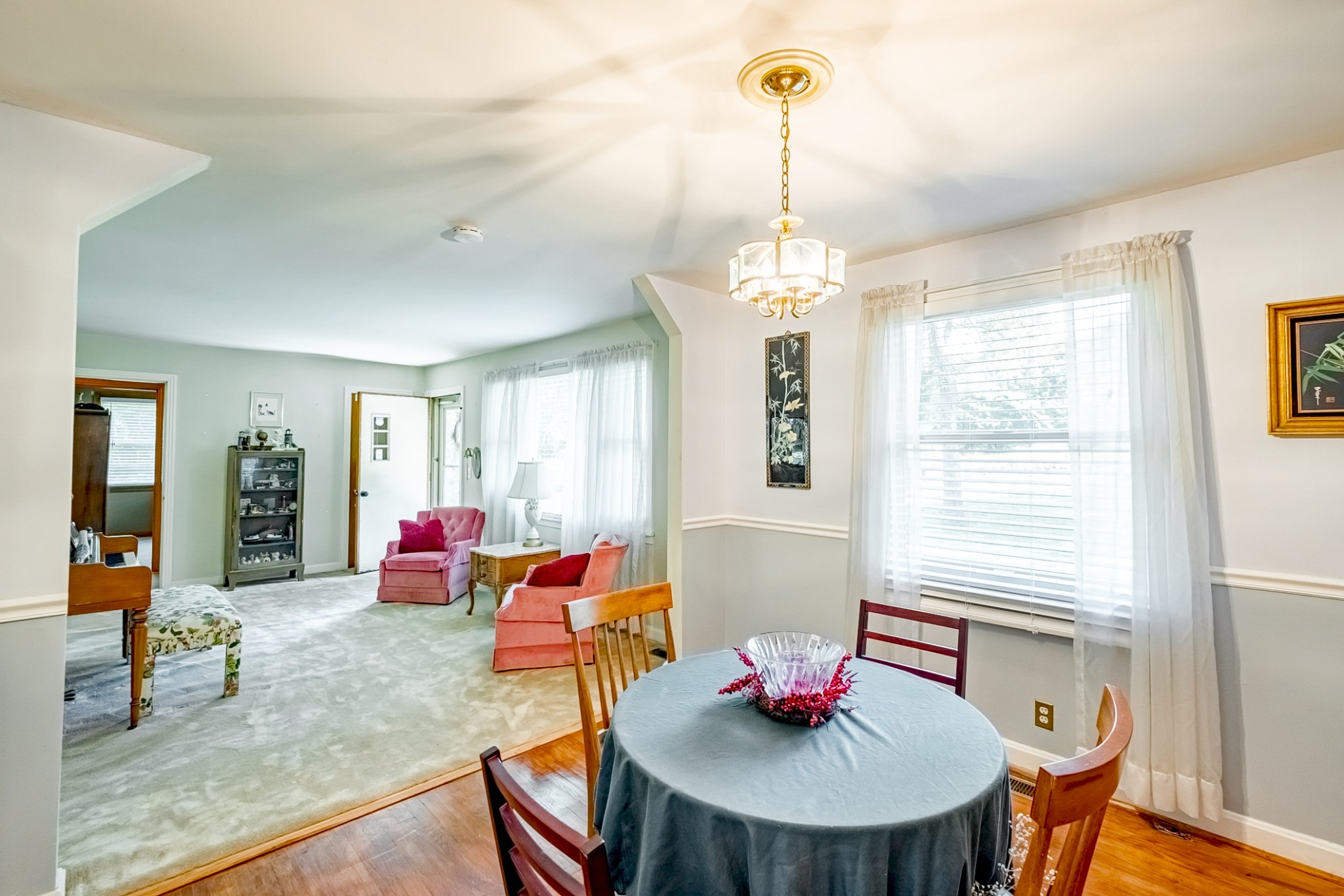 922 Neelys Bend Road Madison, TN 37115 - Photo 16 of 35 a view of a dining room with furniture window and wooden floor