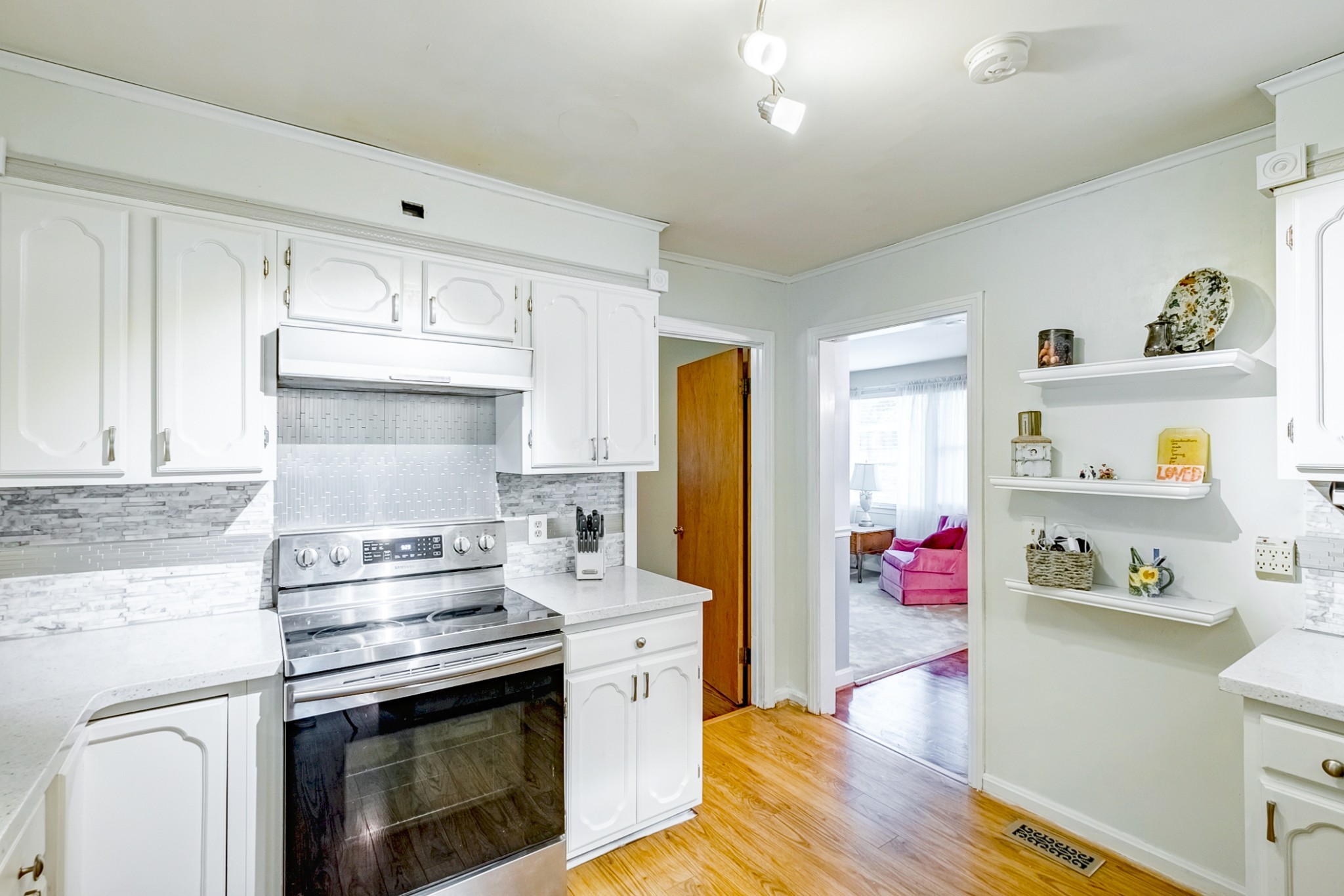 922 Neelys Bend Road Madison, TN 37115 - Photo 20 of 35 a kitchen with a stove and cabinets