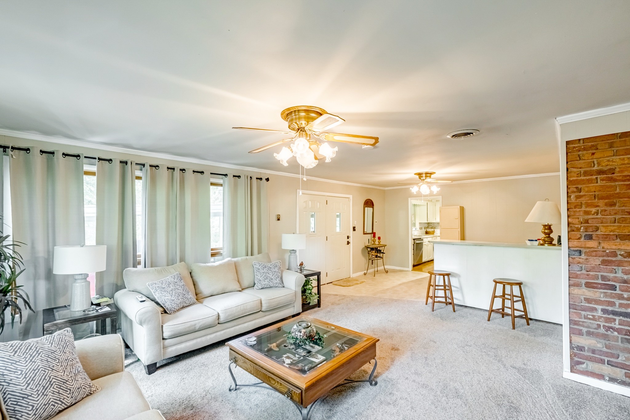 922 Neelys Bend Road Madison, TN 37115 - Photo 23 of 35 a living room with furniture and a large window