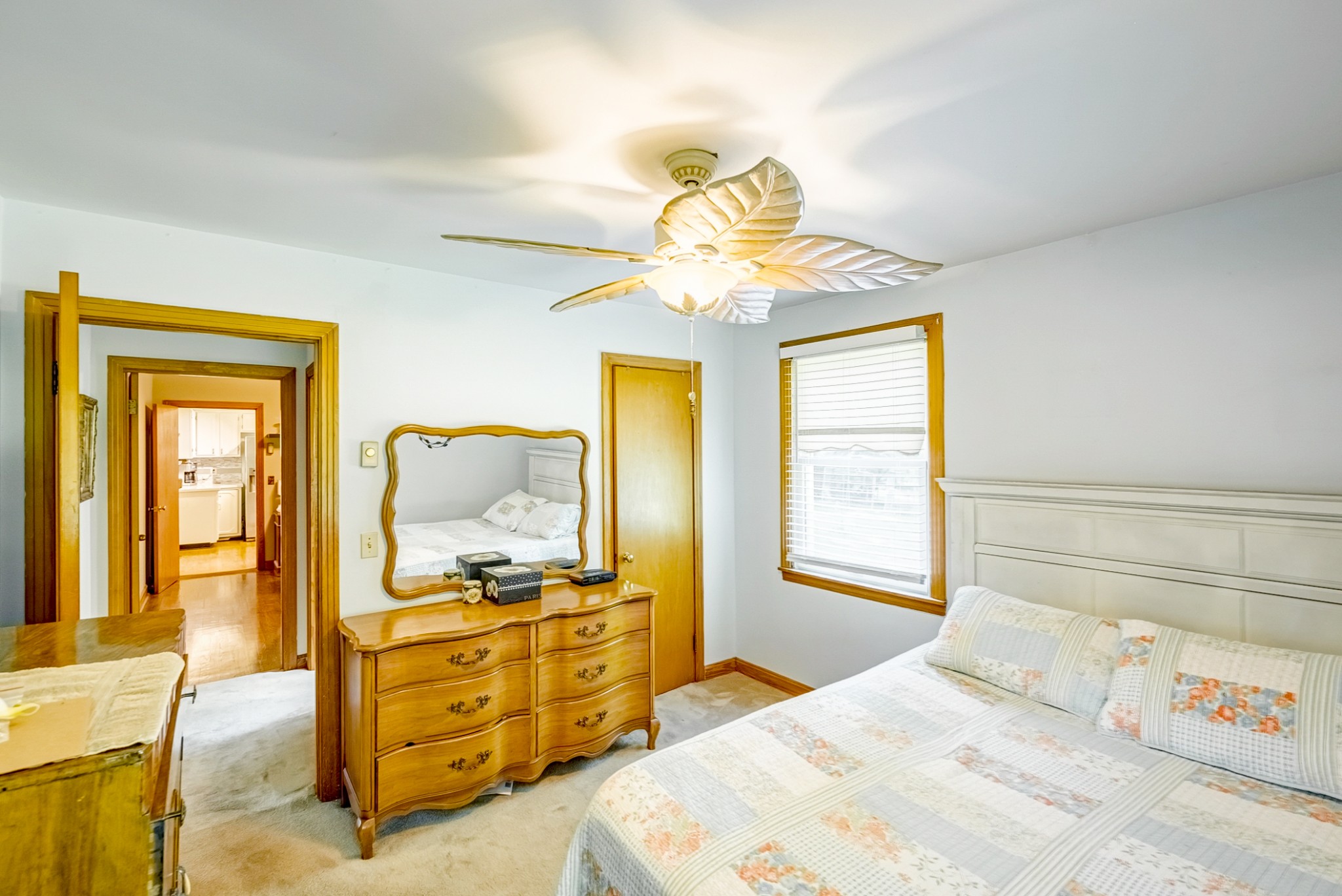 922 Neelys Bend Road Madison, TN 37115 - Photo 6 of 35 a bedroom with a bed and dresser with mirror