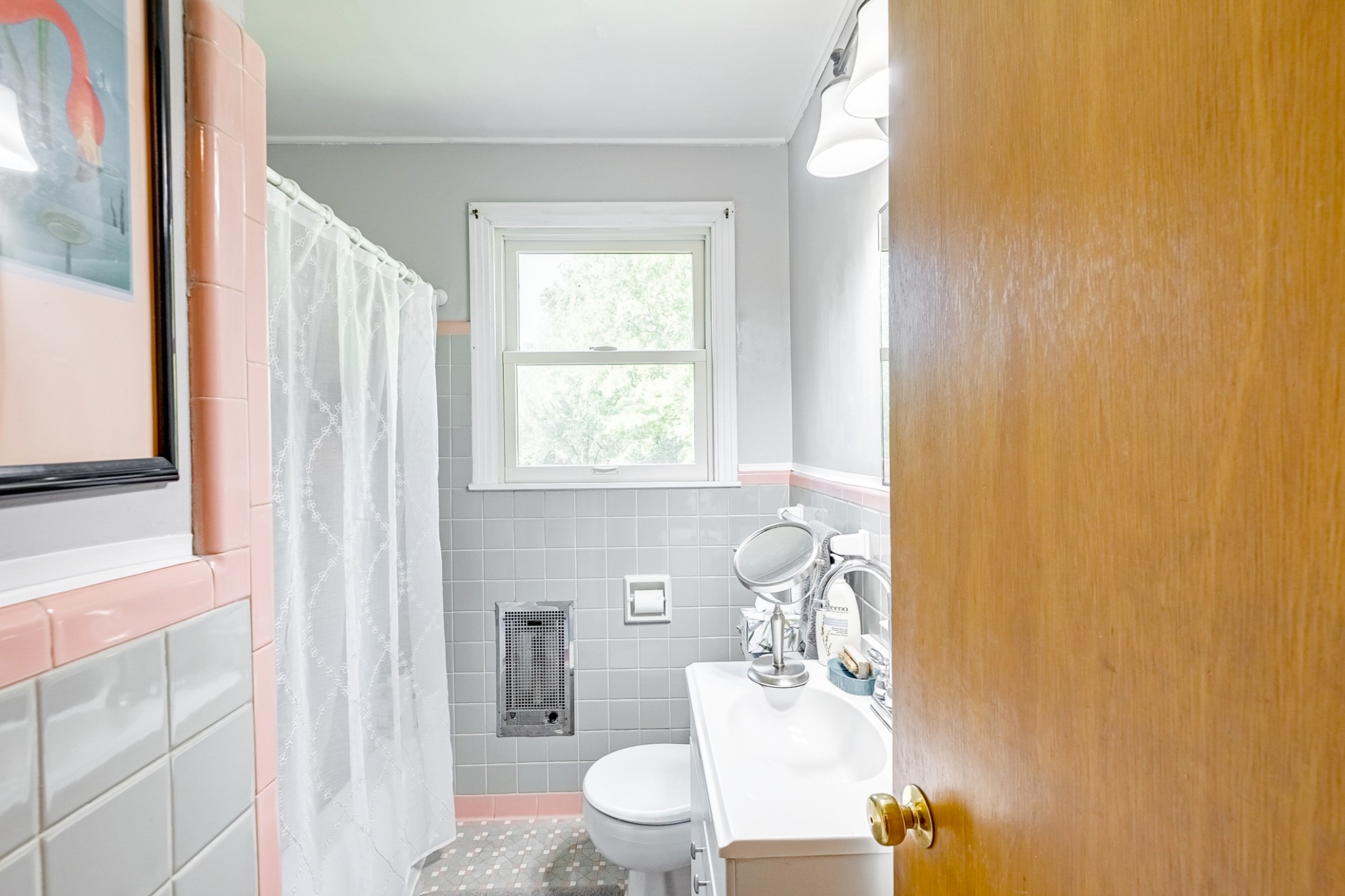 922 Neelys Bend Road Madison, TN 37115 - Photo 7 of 35 a bathroom with a sink vanity mirror and toilet