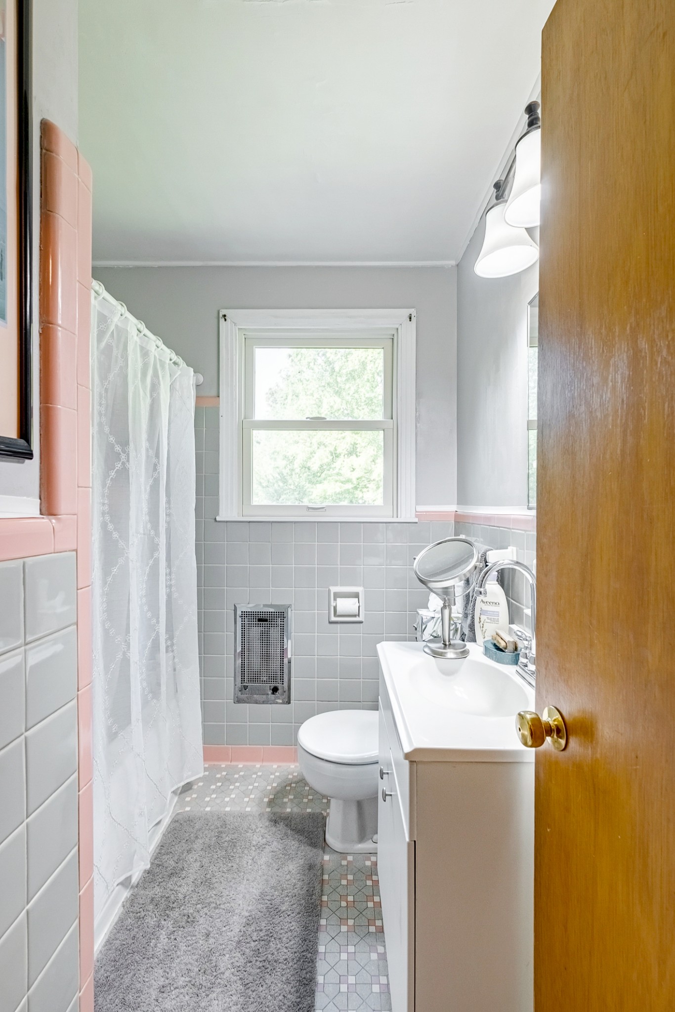 922 Neelys Bend Road Madison, TN 37115 - Photo 8 of 35 a bathroom with a sink toilet and shower
