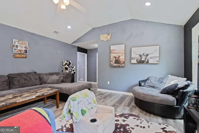 a living room with furniture and a couch