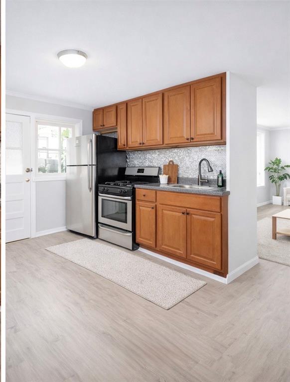 1956 20th Drive Brooklyn, NY 11214 - Photo 12 of 16 a kitchen with stainless steel appliances granite countertop a stove a sink dishwasher and a refrigerator