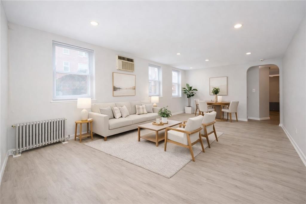 1956 20th Drive Brooklyn, NY 11214 - Photo 7 of 16 a living room with furniture and a window