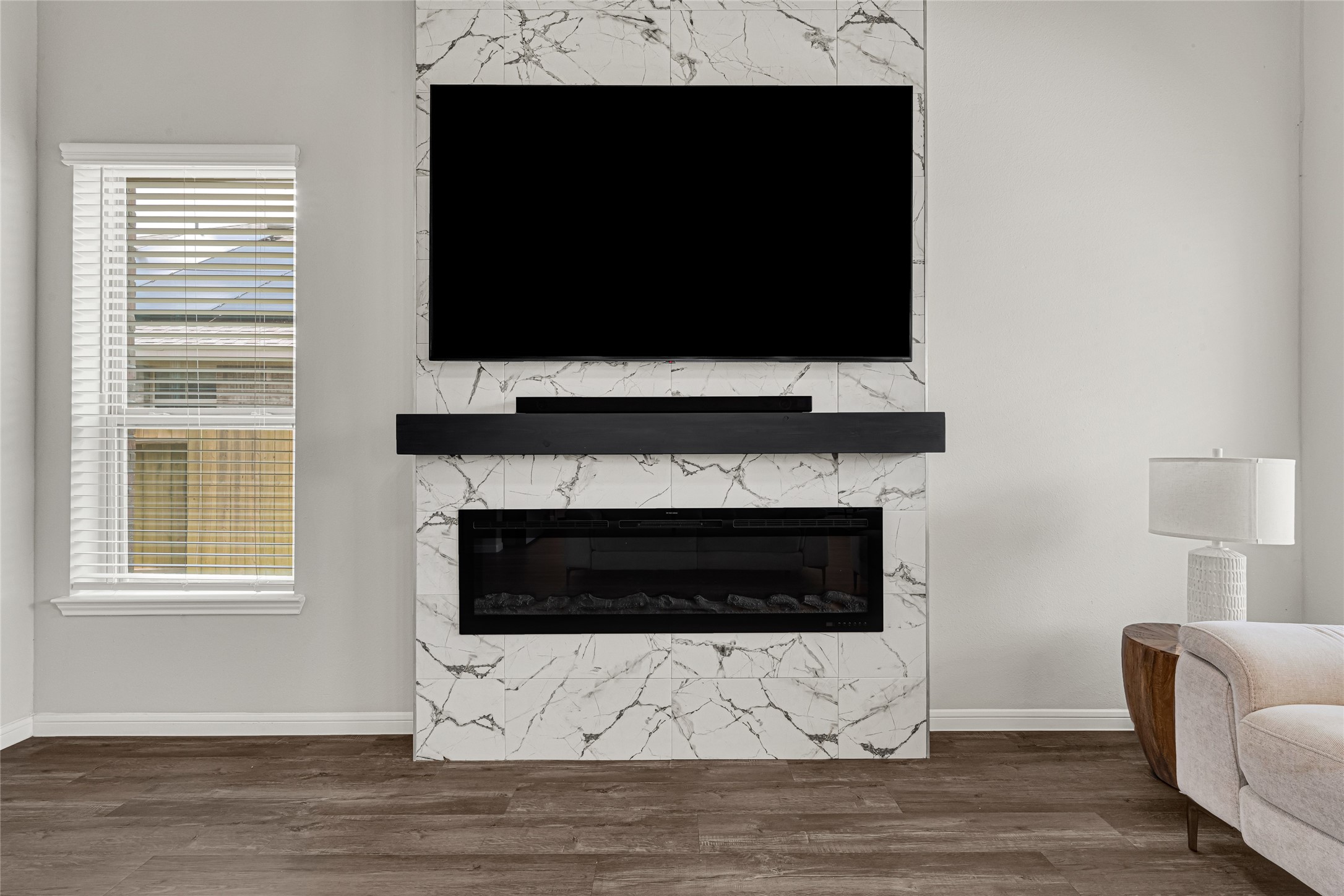 4206 Fenwick Road Texas City, TX 77591 - Photo 10 of 26 The custom-made electrical fireplace was added after purchase as an enhancement to this home. The fireplace provides heat and colorful lighting inside with the use of a remote for your convenience.