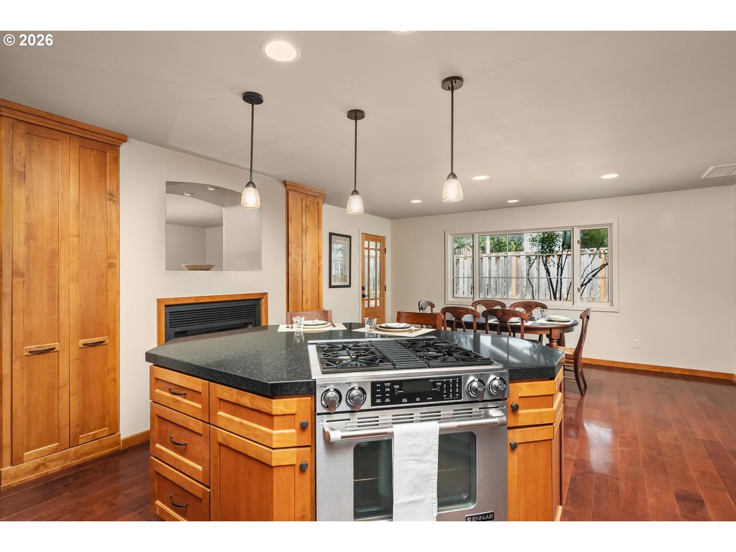 3005 Southwest 113th Avenue Beaverton, OR 97005 - Photo 11 of 30 a kitchen with stainless steel appliances granite countertop a stove a sink and a refrigerator
