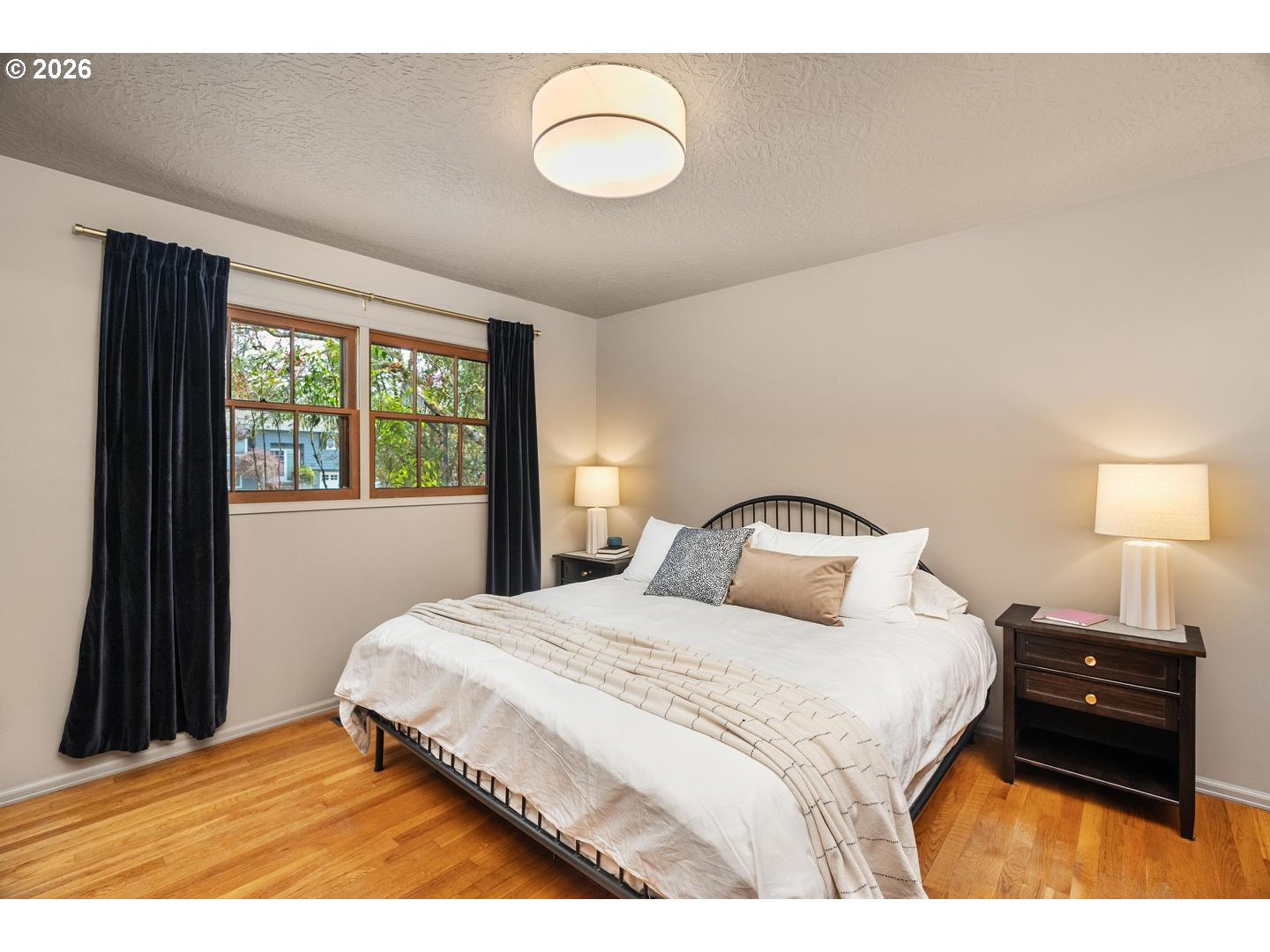 3005 Southwest 113th Avenue Beaverton, OR 97005 - Photo 14 of 30 a bedroom with a bed and a window