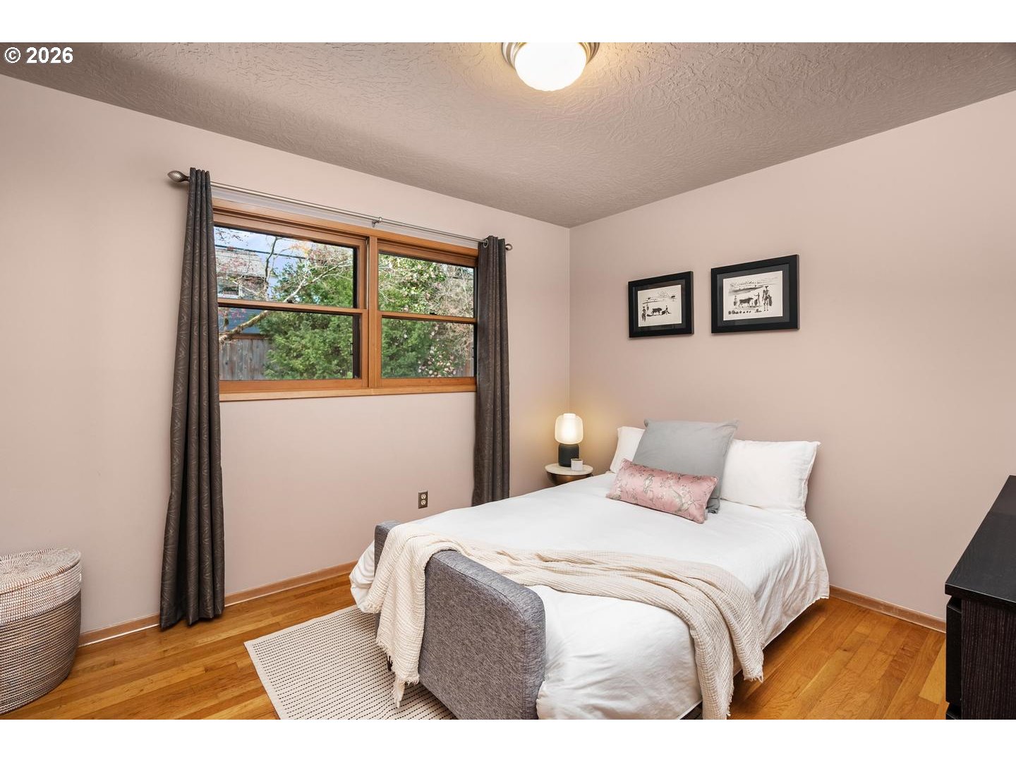 3005 Southwest 113th Avenue Beaverton, OR 97005 - Photo 21 of 30 a bedroom with a bed and a window