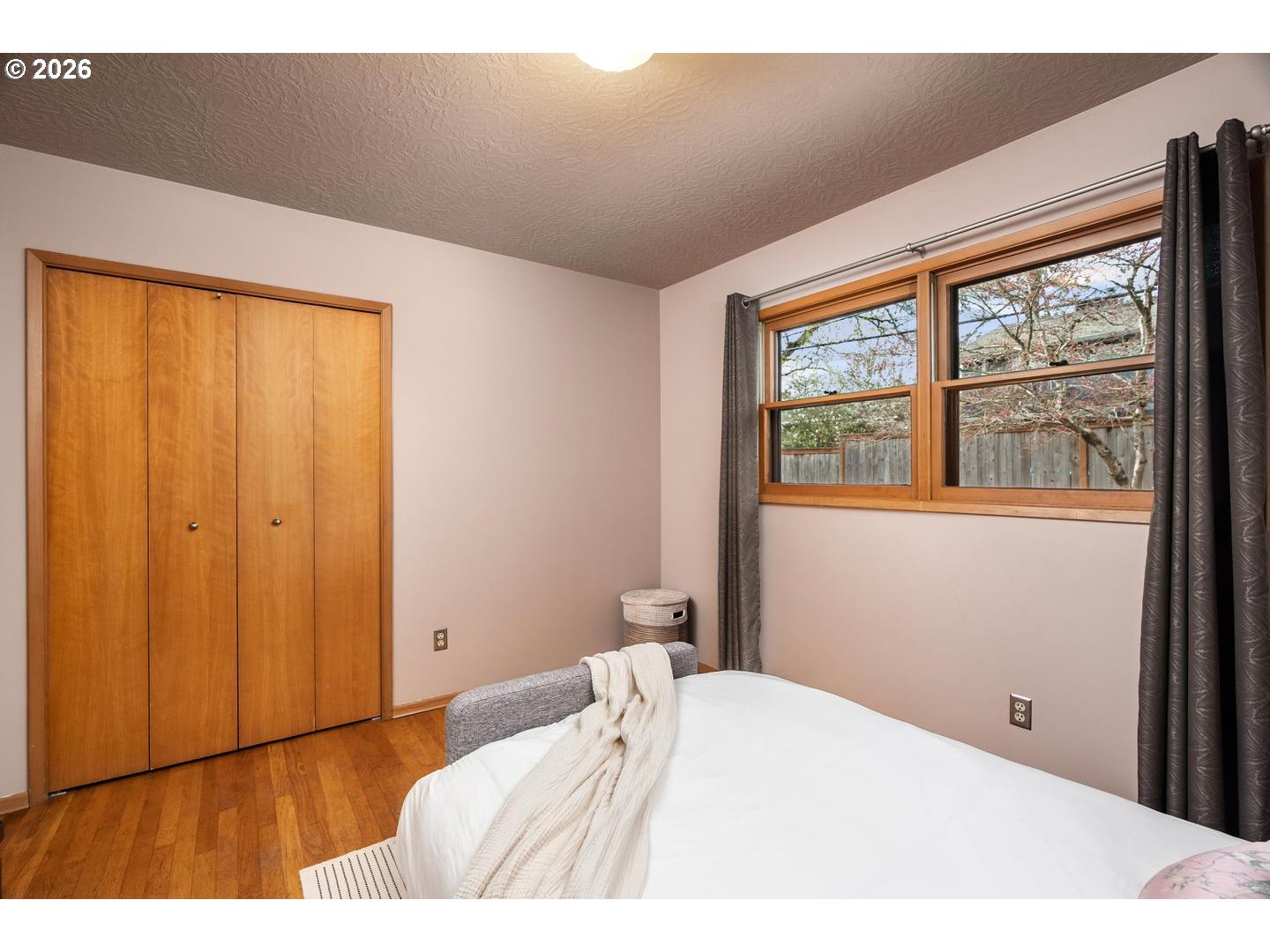 3005 Southwest 113th Avenue Beaverton, OR 97005 - Photo 22 of 30 a bedroom with a bed and a window