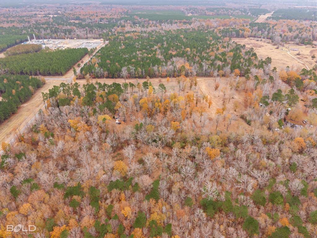 0 John Road Gloster, LA 71030 - Photo 4 of 13 an aerial view of residential houses with outdoor space and trees