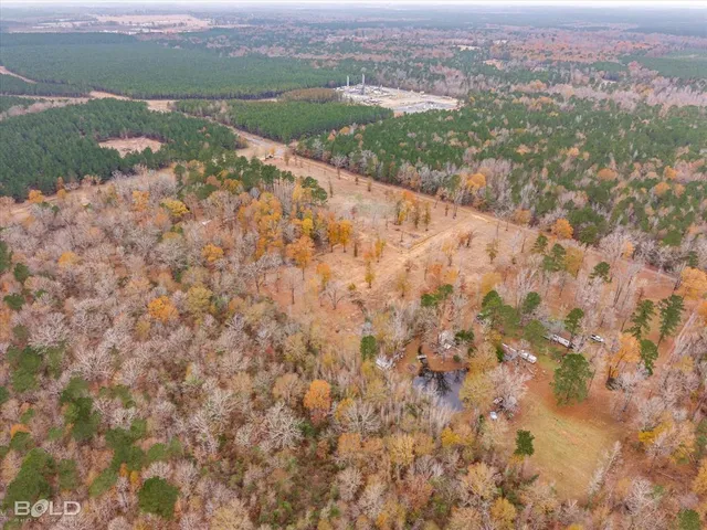 a view of a street with a yard