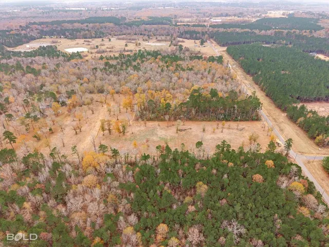 an aerial view of mountain with lake view