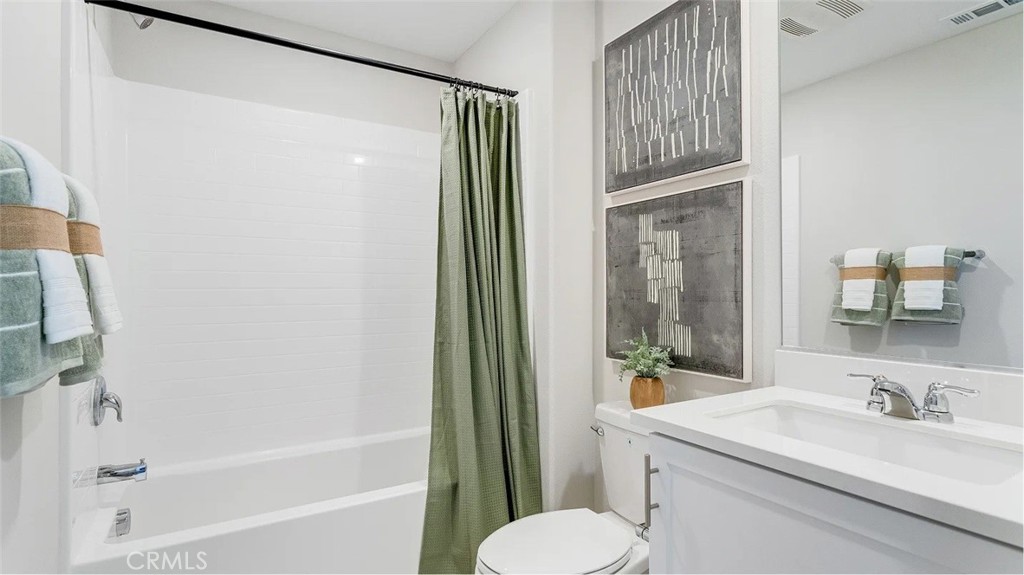 1721 Eagle Road Rialto, CA 92376 - Photo 11 of 23 a bathroom with a sink toilet and shower