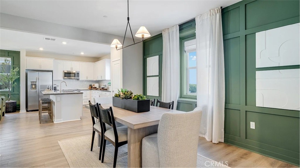 1721 Eagle Road Rialto, CA 92376 - Photo 5 of 23 a dining room with furniture and window