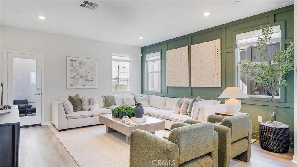 1721 Eagle Road Rialto, CA 92376 - Photo 6 of 23 a living room with furniture and a large window