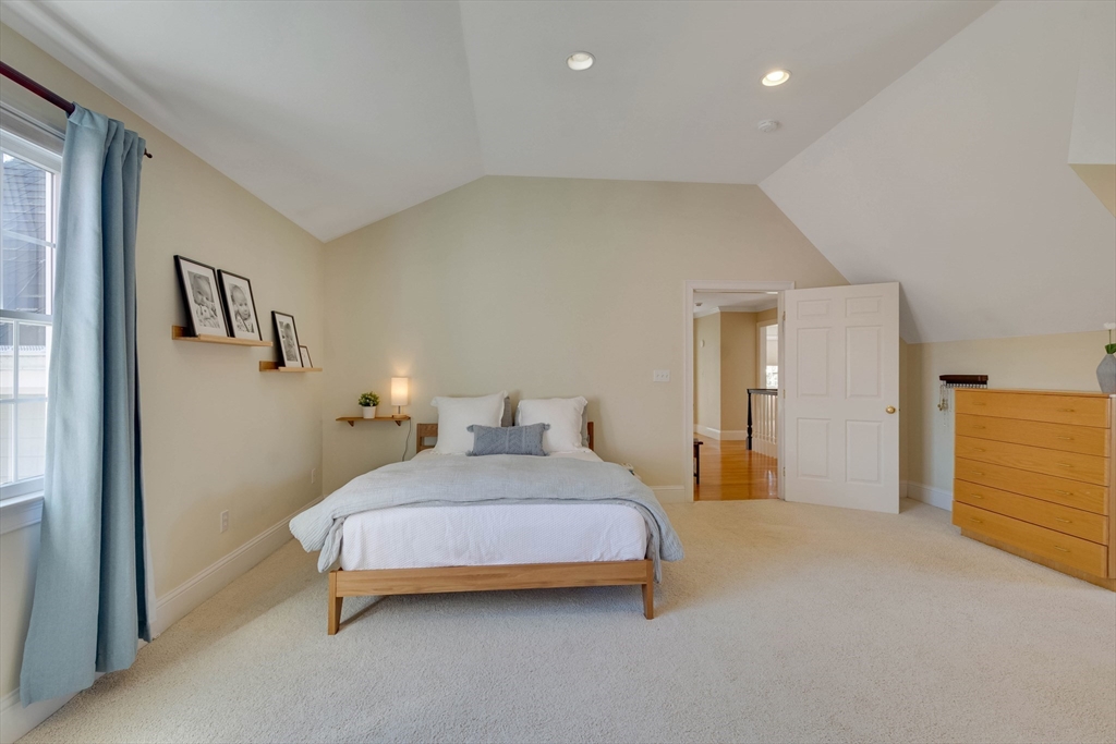 29 Old Bridge Road Concord, MA 01742 - Photo 12 of 40 a bedroom with a bed and a painting on the wall