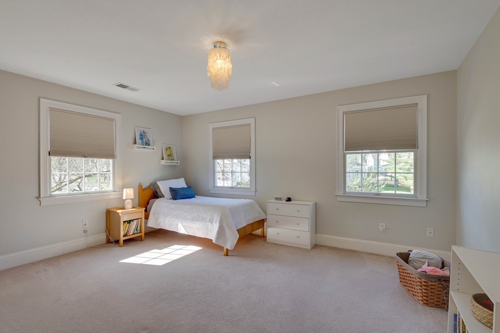 29 Old Bridge Road Concord, MA 01742 - Photo 17 of 40 a bed room with a bed and a window
