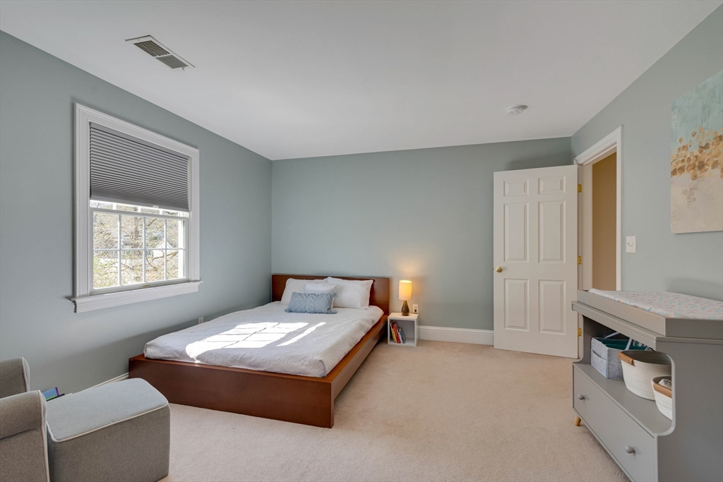 29 Old Bridge Road Concord, MA 01742 - Photo 22 of 40 a bedroom with a bed and a window
