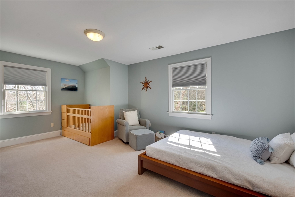 29 Old Bridge Road Concord, MA 01742 - Photo 23 of 40 a bedroom with bed and window
