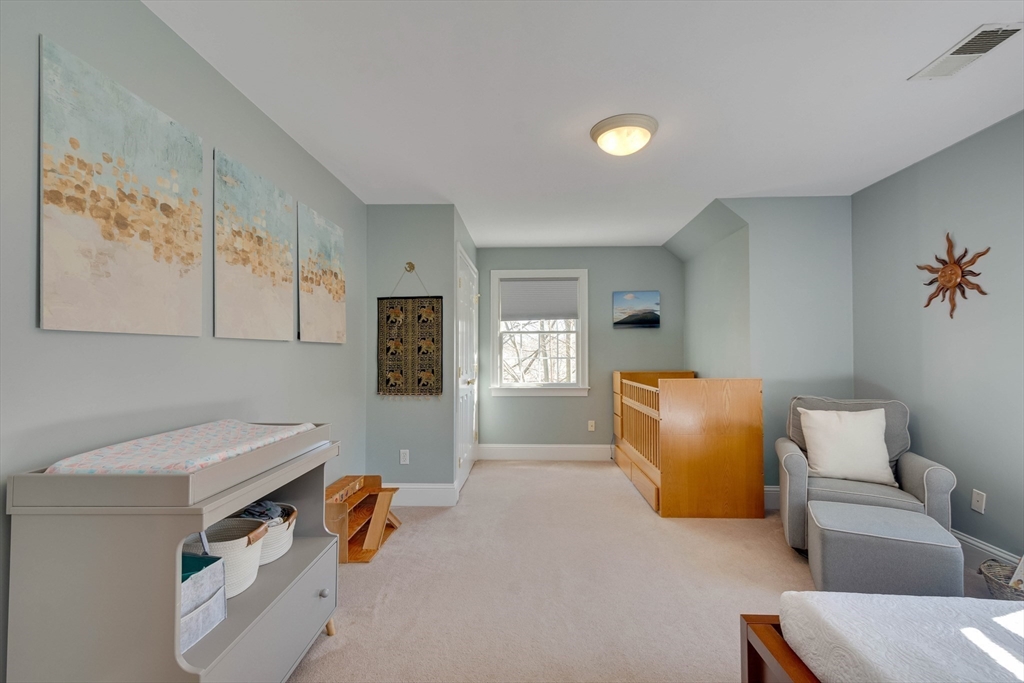 29 Old Bridge Road Concord, MA 01742 - Photo 25 of 40 a bedroom with furniture and a couch