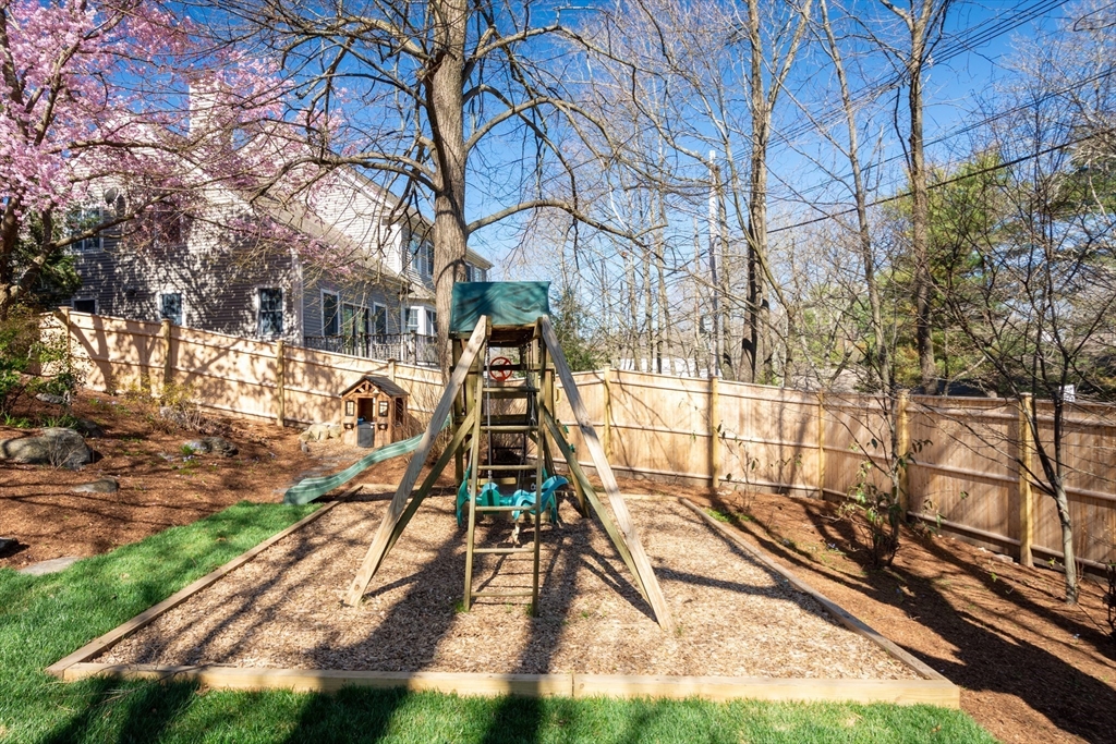 29 Old Bridge Road Concord, MA 01742 - Photo 27 of 40 a view of a house with a backyard