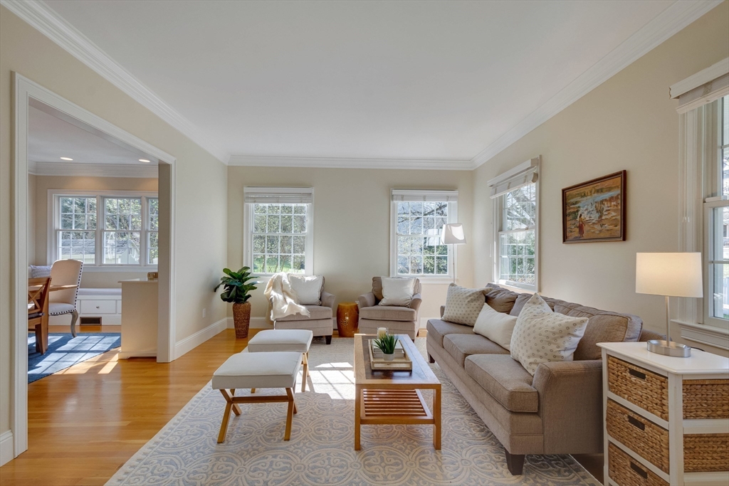 29 Old Bridge Road Concord, MA 01742 - Photo 29 of 40 a living room with furniture wooden floor and a large window