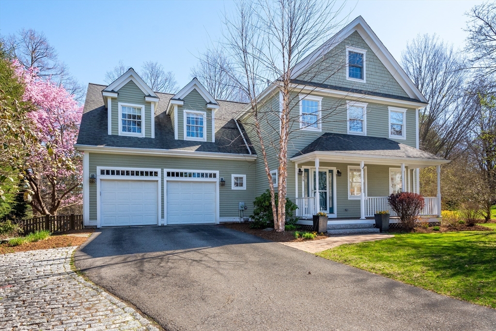 29 Old Bridge Road Concord, MA 01742 - Photo 40 of 40 a front view of a house with a yard and porch